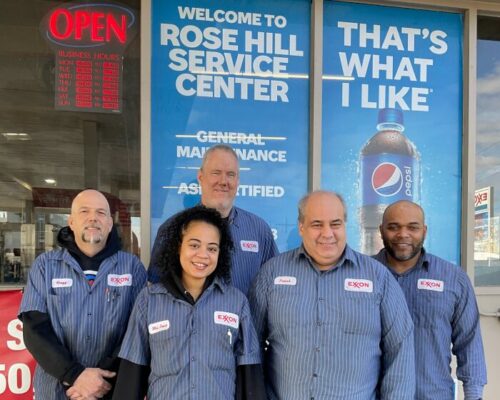 Group of mechanics smiling